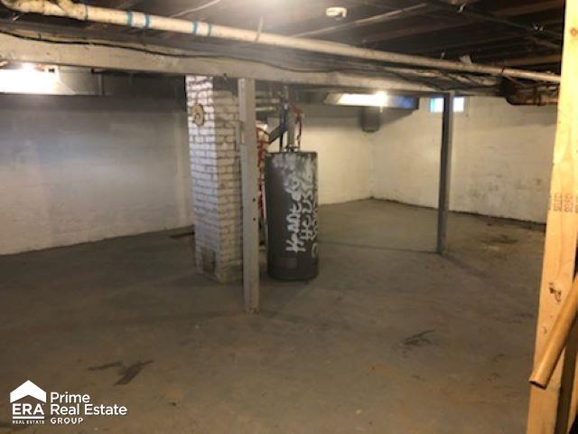 1404 E Kurtz Ave, Flint, MI 48505 - unfinished basement with gas water heater