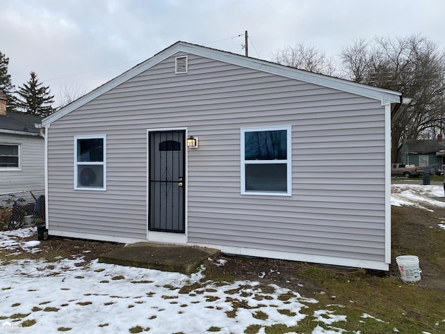 1063 Dunkirk Ave, Mount Morris, MI 48458 - view of snow covered rear of property