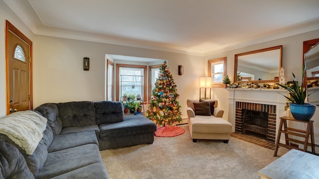 carpeted living room featuring a brick fireplace, a healthy amount of sunlight, and crown molding