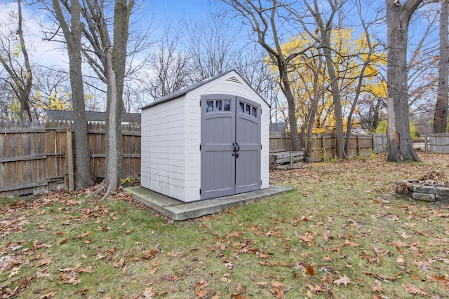 view of outdoor structure with a lawn