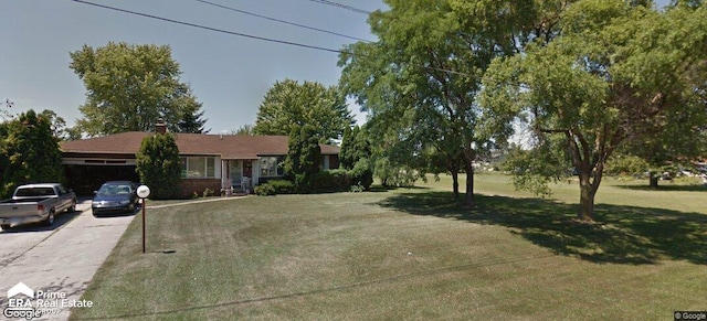 1587 Mcalpine Dr, Mount Morris, MI 48458 - view of front of property with a front yard