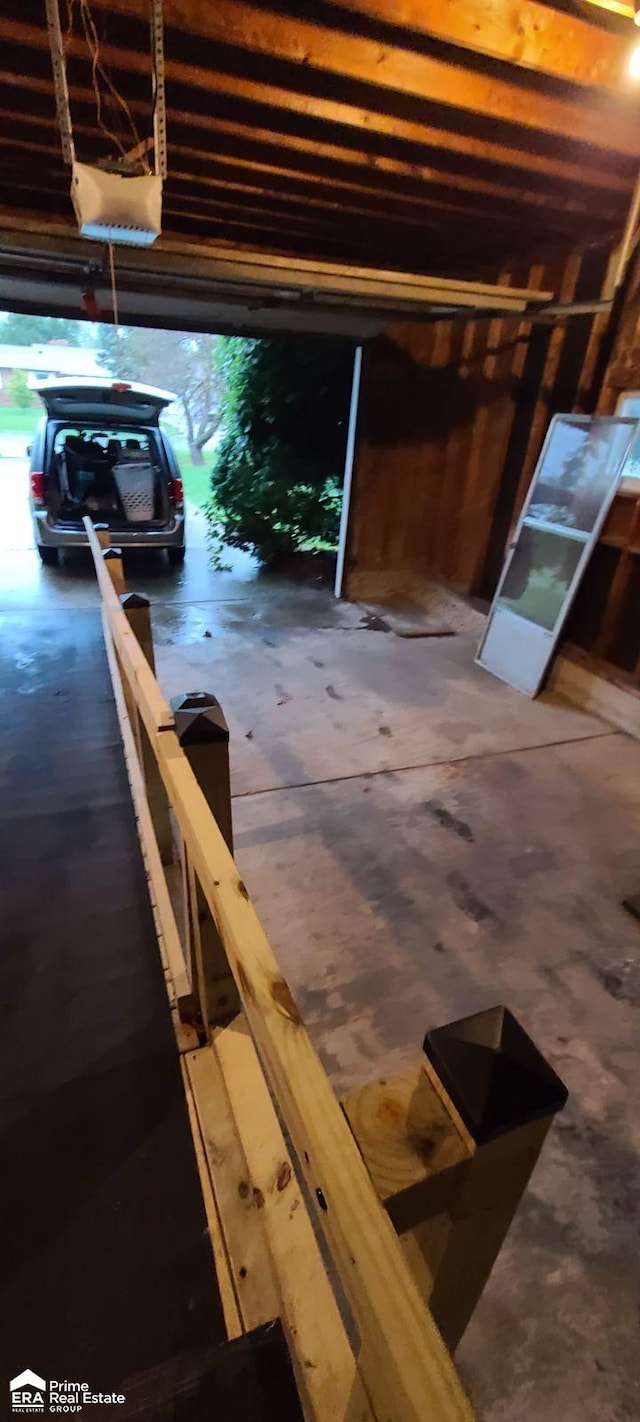 1587 Mcalpine Dr, Mount Morris, MI 48458 - garage featuring a garage door opener