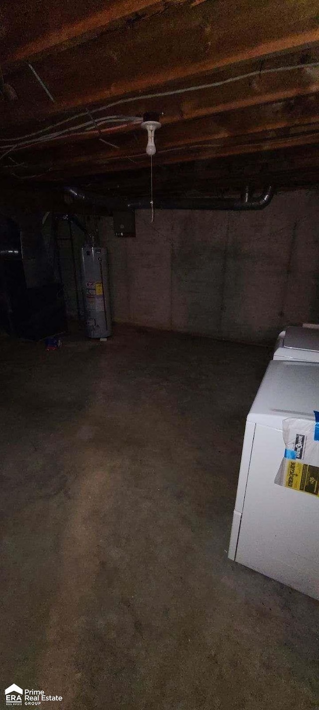 basement with gas water heater and separate washer and dryer