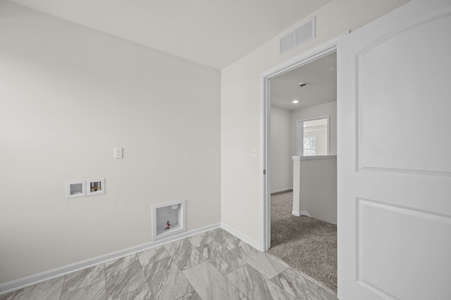 laundry area with visible vents, baseboards, and hookup for a washing machine