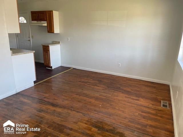 interior space featuring dark wood-type flooring