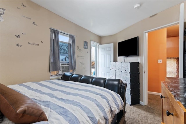 bedroom featuring light colored carpet