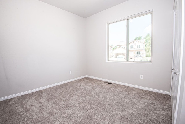 view of carpeted spare room