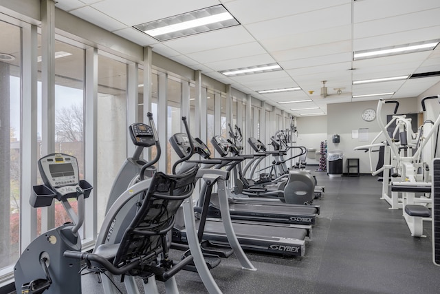 workout area with a drop ceiling