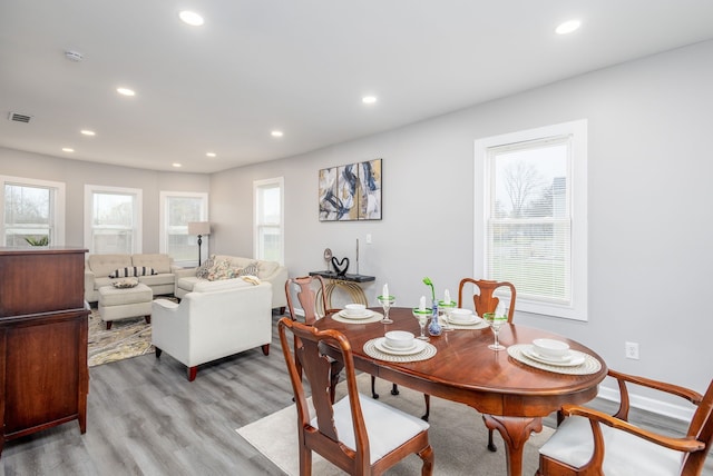 dining room featuring light hardwood / wood-style floors