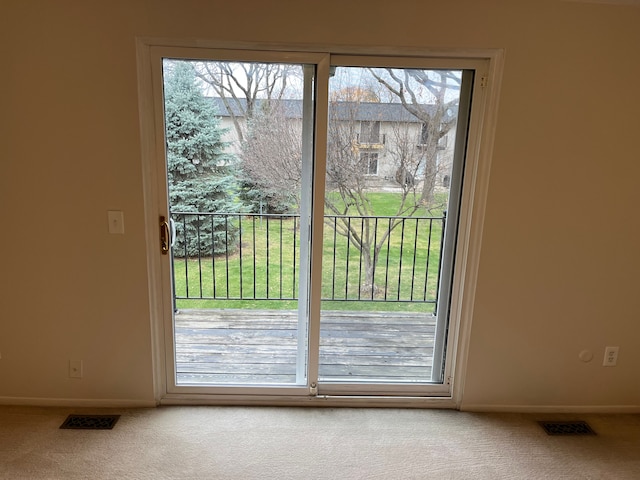 entryway featuring carpet flooring