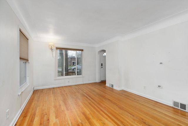 unfurnished room with light hardwood / wood-style floors