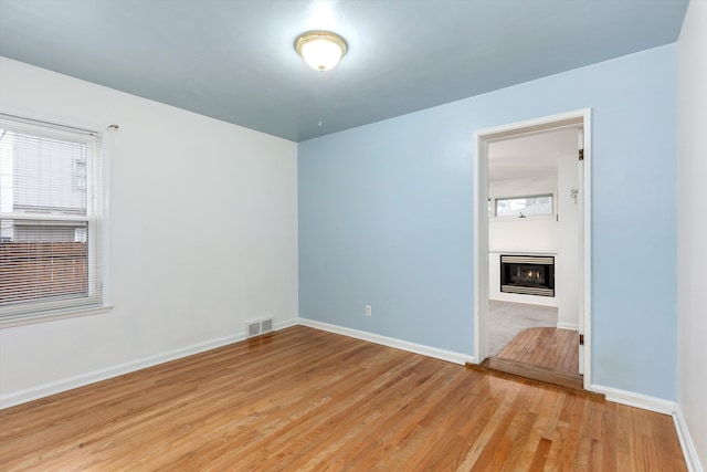 empty room featuring light hardwood / wood-style floors