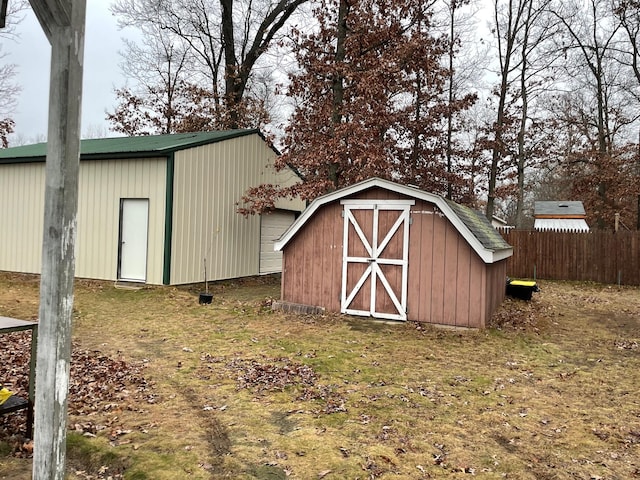 view of outdoor structure with a lawn