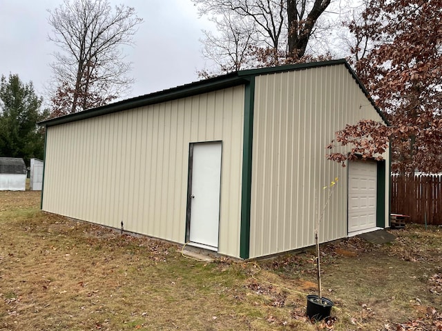 view of outdoor structure with a garage