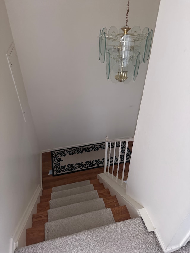 19975 S Great Oaks Cir, Clinton Township, MI 48036 - stairs featuring a chandelier