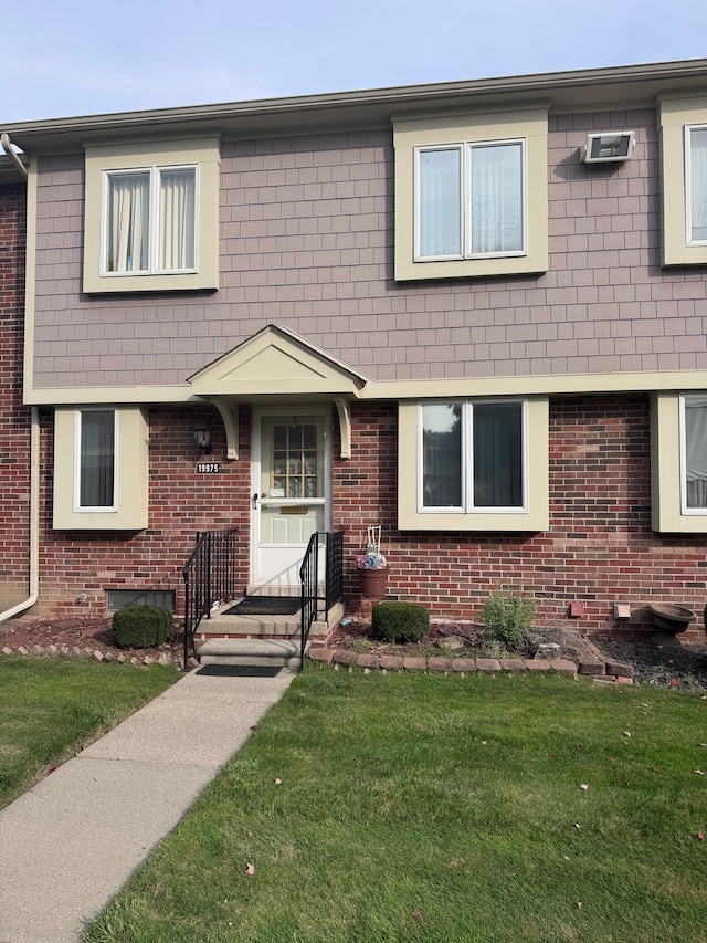 19975 S Great Oaks Cir, Clinton Township, MI 48036 - view of front of property with a front lawn and brick siding