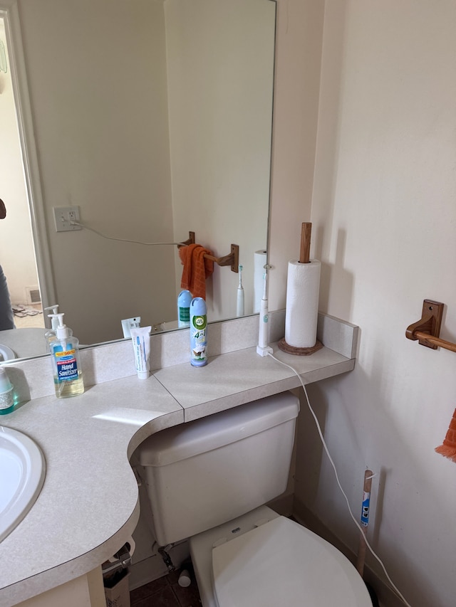 19975 S Great Oaks Cir, Clinton Township, MI 48036 - half bathroom with toilet, tile patterned flooring, and vanity