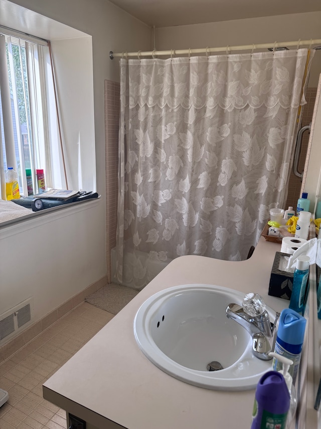 19975 S Great Oaks Cir, Clinton Township, MI 48036 - bathroom with vanity and a shower with shower curtain