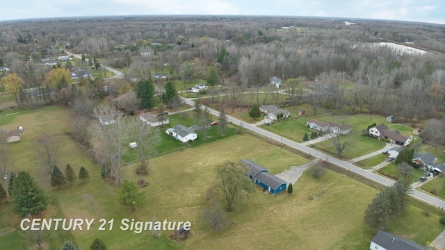 8168 Vassar Rd, Mount Morris, MI 48458 - view of property location featuring a heavily wooded area