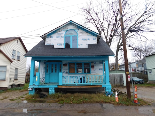 816 Normal Ct, Kalamazoo, MI 49007 - property under construction with covered porch and roof with shingles