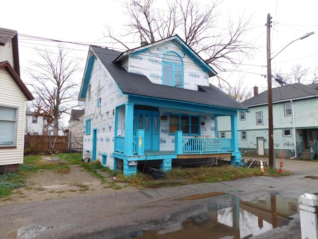 816 Normal Ct, Kalamazoo, MI 49007 - property in mid-construction with covered porch and roof with shingles