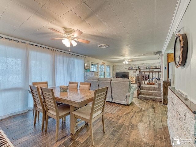 11477 Highland Hills Dr, Jerome, MI 49249 - dining room with ceiling fan and wood finished floors