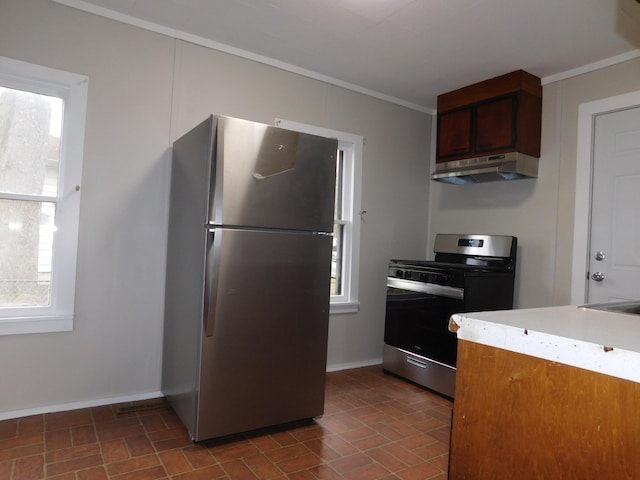 kitchen featuring crown molding and appliances with stainless steel finishes