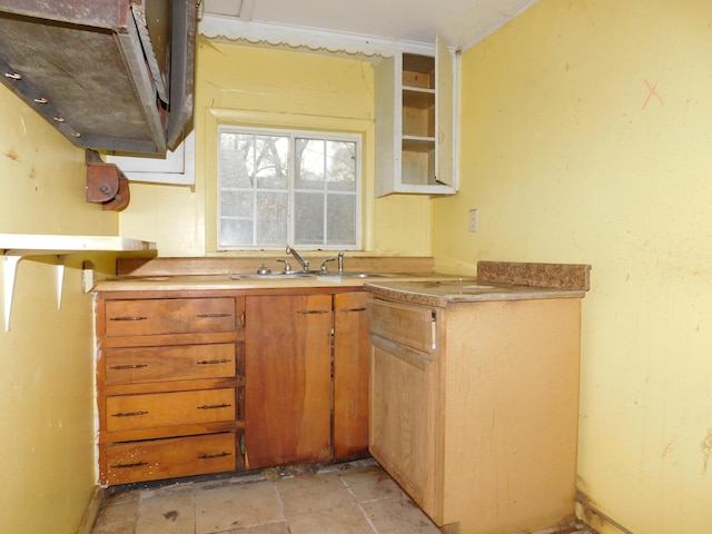 2265 Holly St, Benton Harbor, MI 49022 - kitchen with a sink, open shelves, light stone finish flooring, brown cabinetry, and light countertops