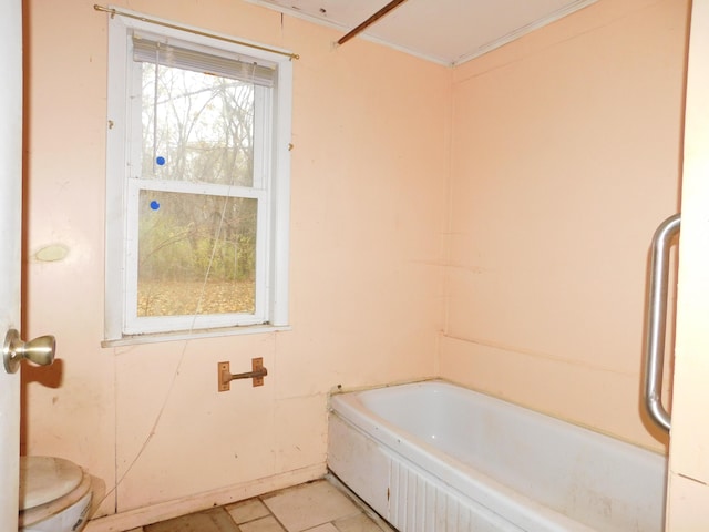 2265 Holly St, Benton Harbor, MI 49022 - full bathroom featuring a tub and toilet