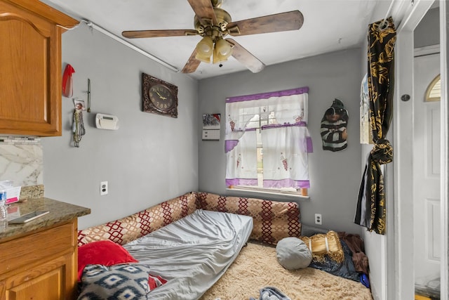 bedroom featuring ceiling fan