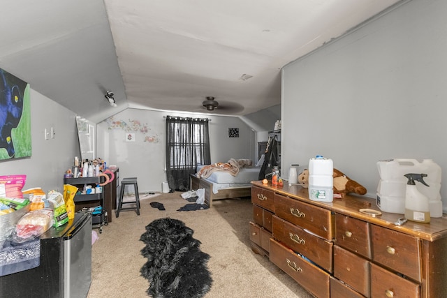 bedroom featuring light carpet and vaulted ceiling