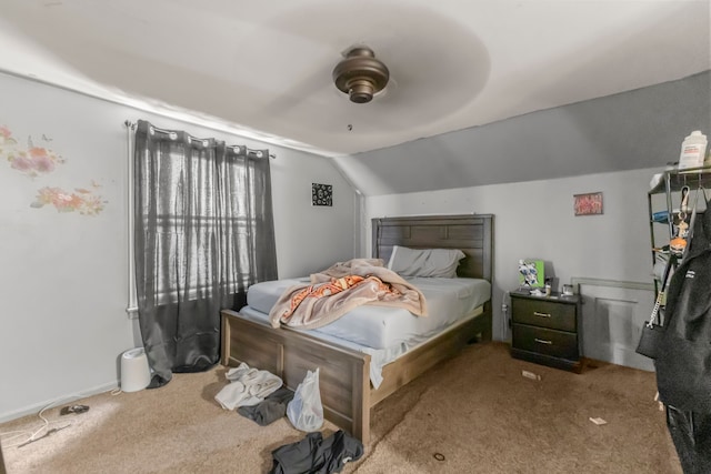 bedroom with ceiling fan, light colored carpet, and lofted ceiling