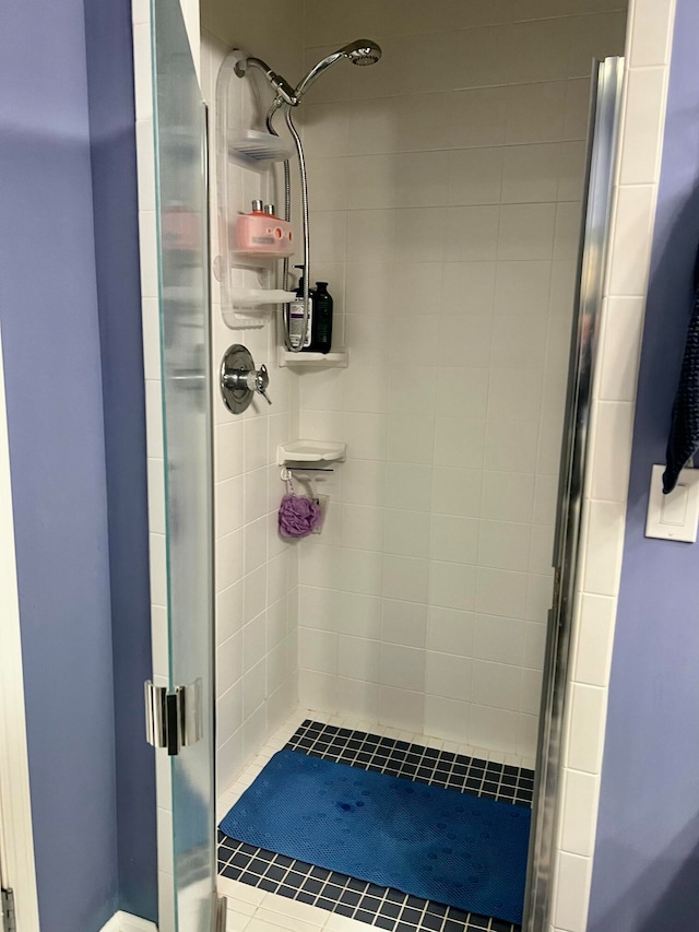 bathroom featuring tile patterned floors and walk in shower