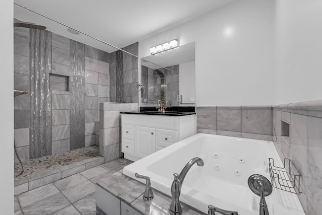 bathroom featuring tile patterned flooring, vanity, tile walls, and independent shower and bath