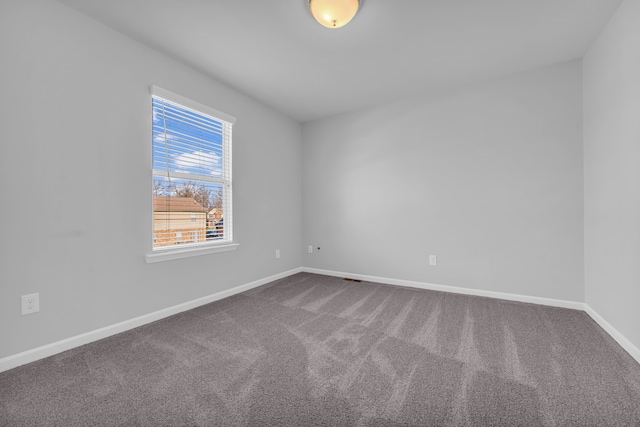 view of carpeted spare room