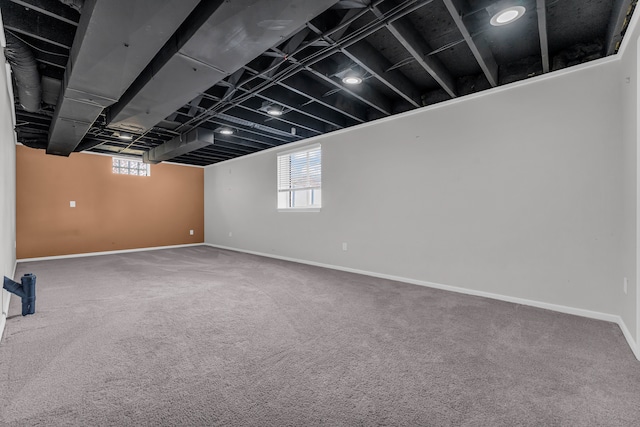 basement featuring carpet flooring