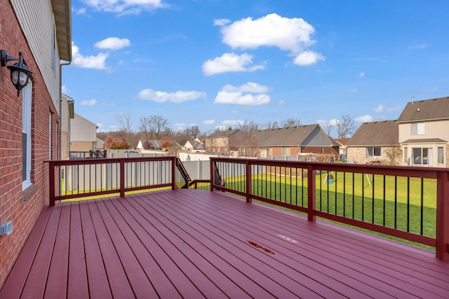 deck featuring a lawn