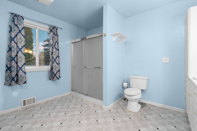 bathroom featuring toilet