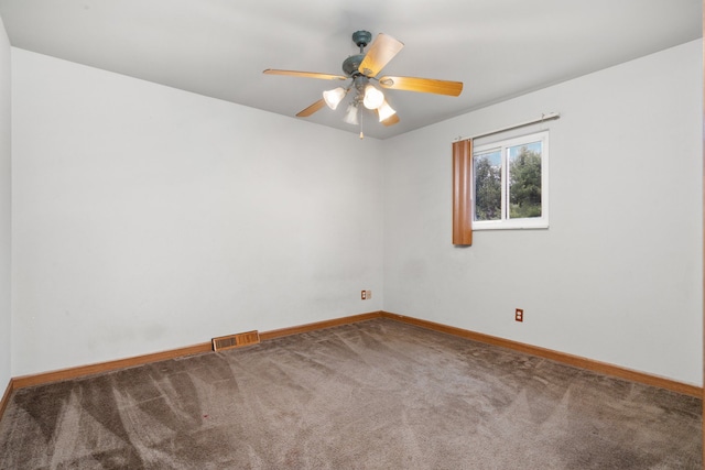 spare room with carpet and ceiling fan