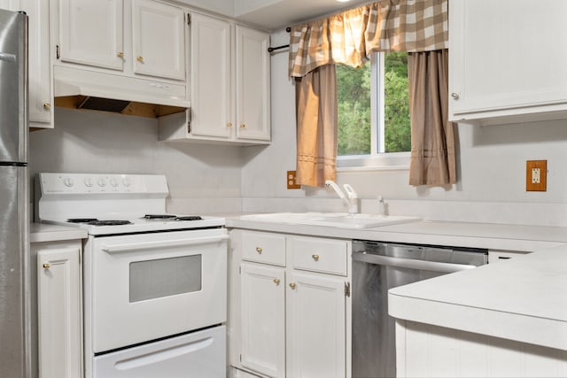 kitchen featuring sink, white cabinets, and stainless steel appliances