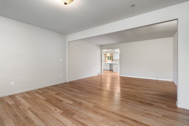 spare room with light hardwood / wood-style floors