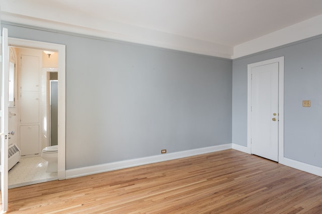 unfurnished room featuring light hardwood / wood-style flooring