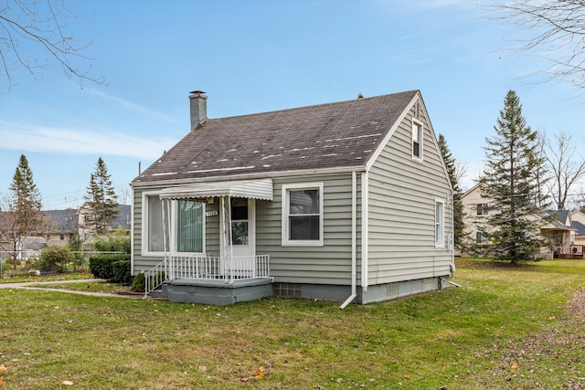 5570 Meadow View St, Sterling Heights, MI 48310 - view of front of house with a chimney, a front yard, and a shingled roof
