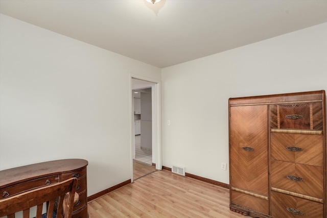 bedroom with light hardwood / wood-style flooring