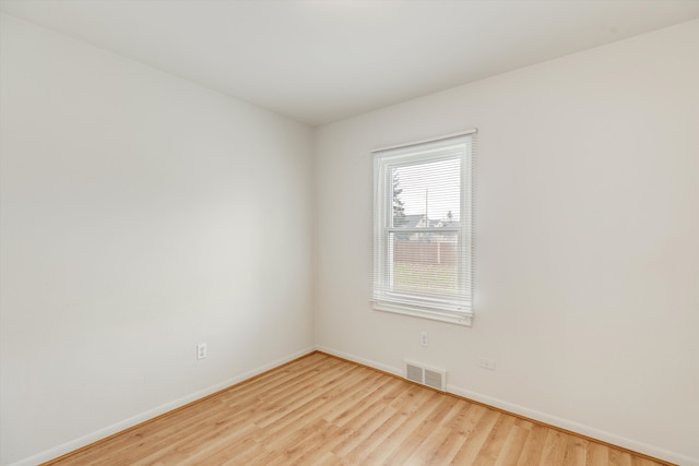 5570 Meadow View St, Sterling Heights, MI 48310 - unfurnished room featuring wood finished floors and baseboards
