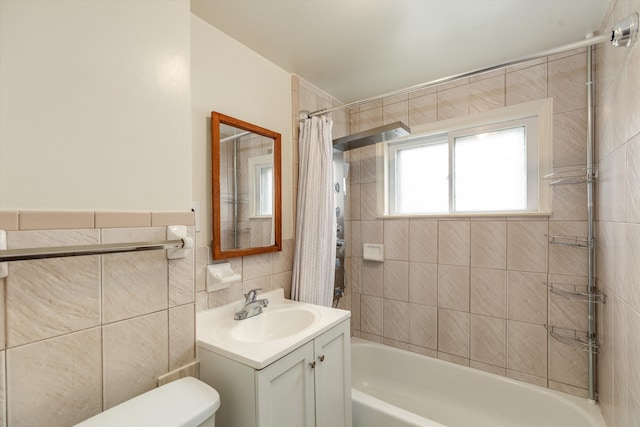 5570 Meadow View St, Sterling Heights, MI 48310 - bathroom with tile walls, shower / bathtub combination with curtain, vanity, and toilet