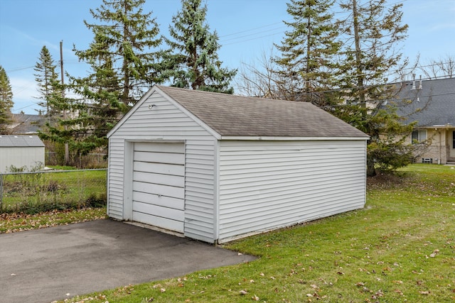 garage with a lawn