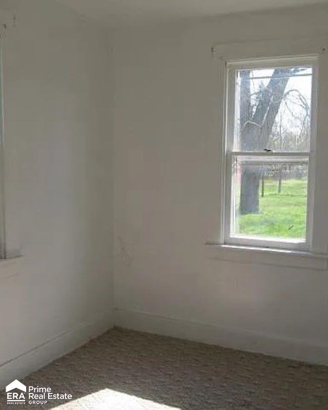 6458 Summit St, Mount Morris, MI 48458 - empty room featuring healthy amount of natural light
