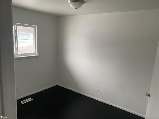 5509 Farmhill Rd, Flint, MI 48505 - spare room with baseboards