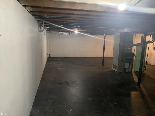 5509 Farmhill Rd, Flint, MI 48505 - unfinished below grade area featuring heating unit